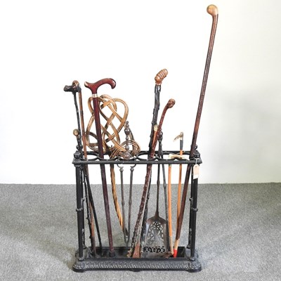 Lot 132 - A cast iron six division stick stand, 61cm...