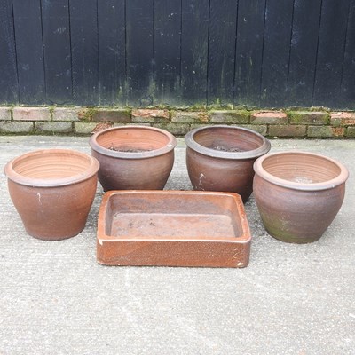 Lot 515 - Four glazed garden pots, together with a...