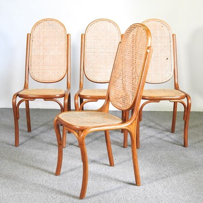 Lot 665 - A set of four cane seated bentwood dining...