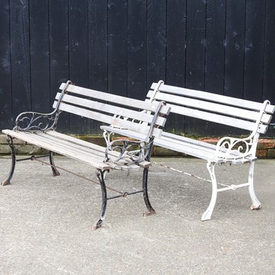 Lot 476 - A near pair of wooden garden benches on metal...