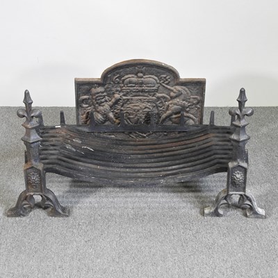 Lot 333 - A large cast iron fire grate, 90cm wide, with...