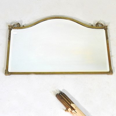 Lot 640 - An early 20th century brass framed wall mirror,...