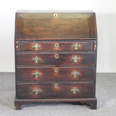 Lot 459 - A George III oak bureau