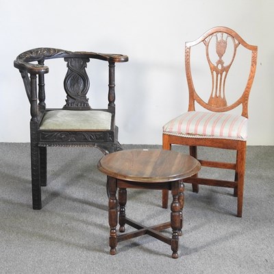 Lot 669 - A 19th century carved oak corner chair,...