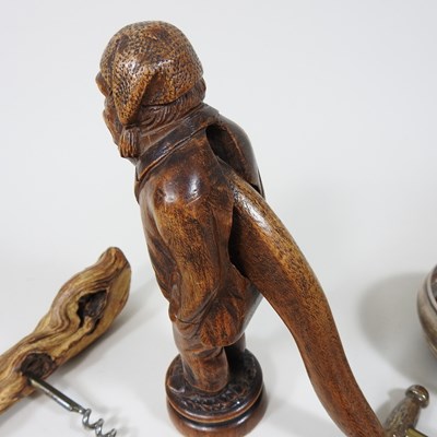 Lot 858 - A continental carved wooden novelty nutcracker,...