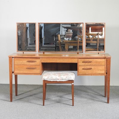 Lot 560 - A mid 20th century teak dressing table, by...