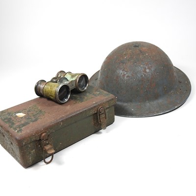 Lot 605 - A military metal helmet, together with a war...