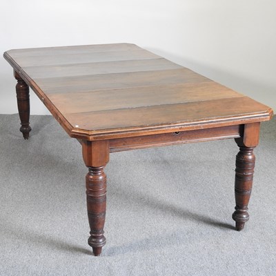 Lot 520 - A Victorian mahogany wind-out extending dining...