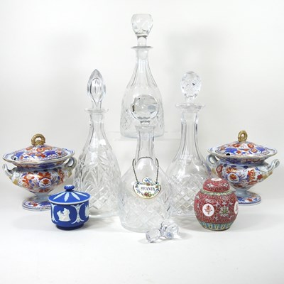 Lot 565 - A collection of four cut glass decanters,...