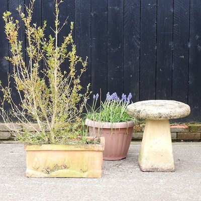 Lot 702 - A cast stone bird bath, together with a...