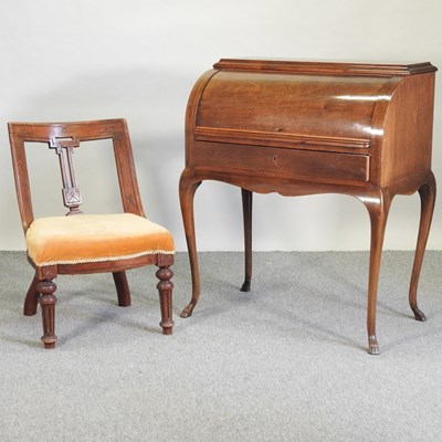 Lot 559 - A reproduction mahogany cylinder top desk