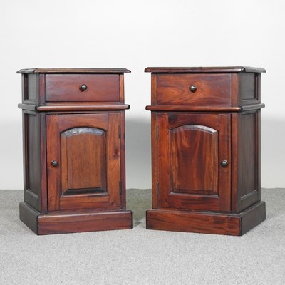 Lot 563 - A pair of hardwood bedside cabinets (2)