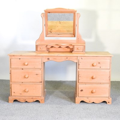 Lot 581 - A modern pine dressing table and mirror