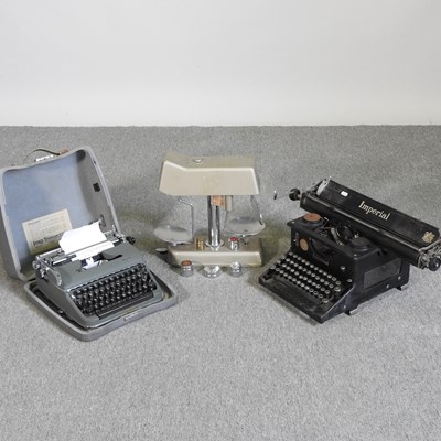 Lot 709 - A vintage Imperial typewriter, together with...