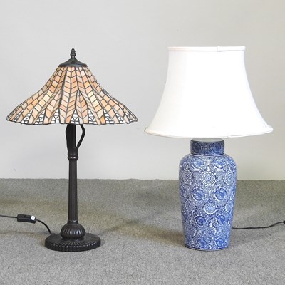 Lot 658 - A Tiffany style table lamp, 63cm high,...