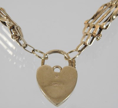 Lot 4 - A 9 carat gold gate bracelet
