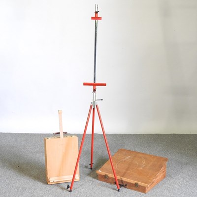 Lot 599 - A metal easel, together with a table easel and...