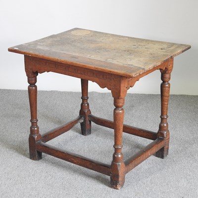 Lot 368 - An 18th century oak side table, on turned legs