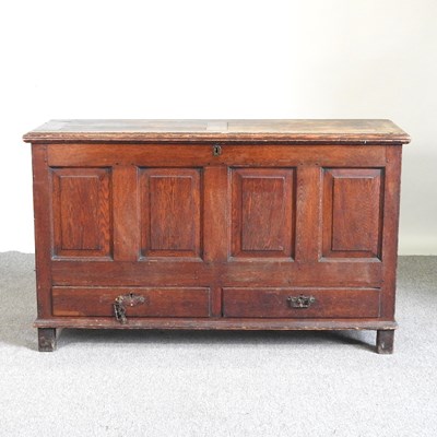 Lot 357 - An 18th century oak dowry chest, with a hinged...