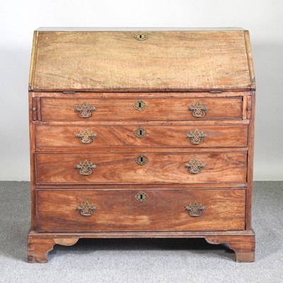 Lot 316 - A George III mahogany bureau, on bracket feet