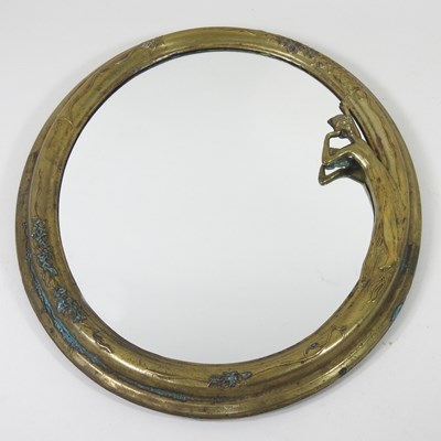 Lot 378 - An Art Nouveau brass framed easel mirror,...