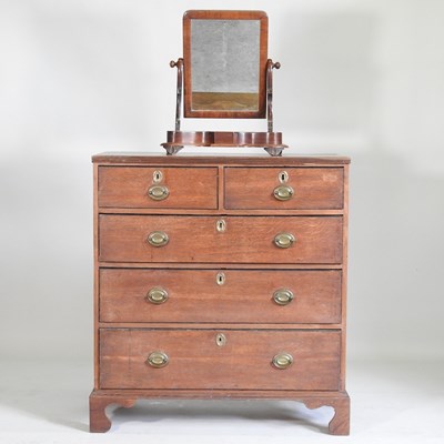 Lot 761 - A George III oak chest of drawers, together...