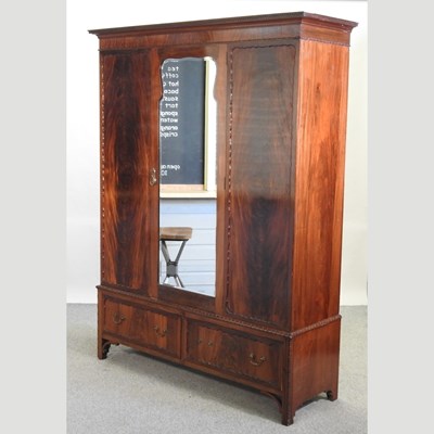 Lot 582 - An Edwardian mahogany wardrobe