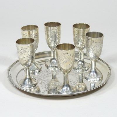 Lot 246 - A Russian silver liqueur set, engraved with...