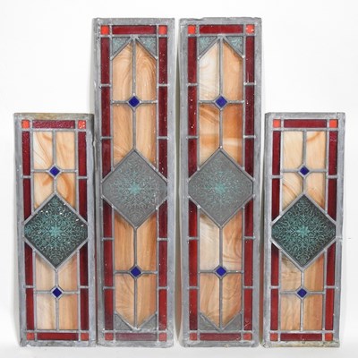 Lot 627 - A pair of leaded stained glass windows,...