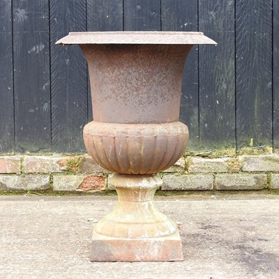 Lot 292 - A large cast iron garden urn, of campana shape,...