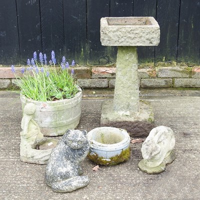 Lot 849 - A cast stone bird bath, 65cm high, together...