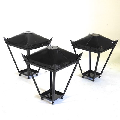 Lot 753 - A set of three black painted metal garden...