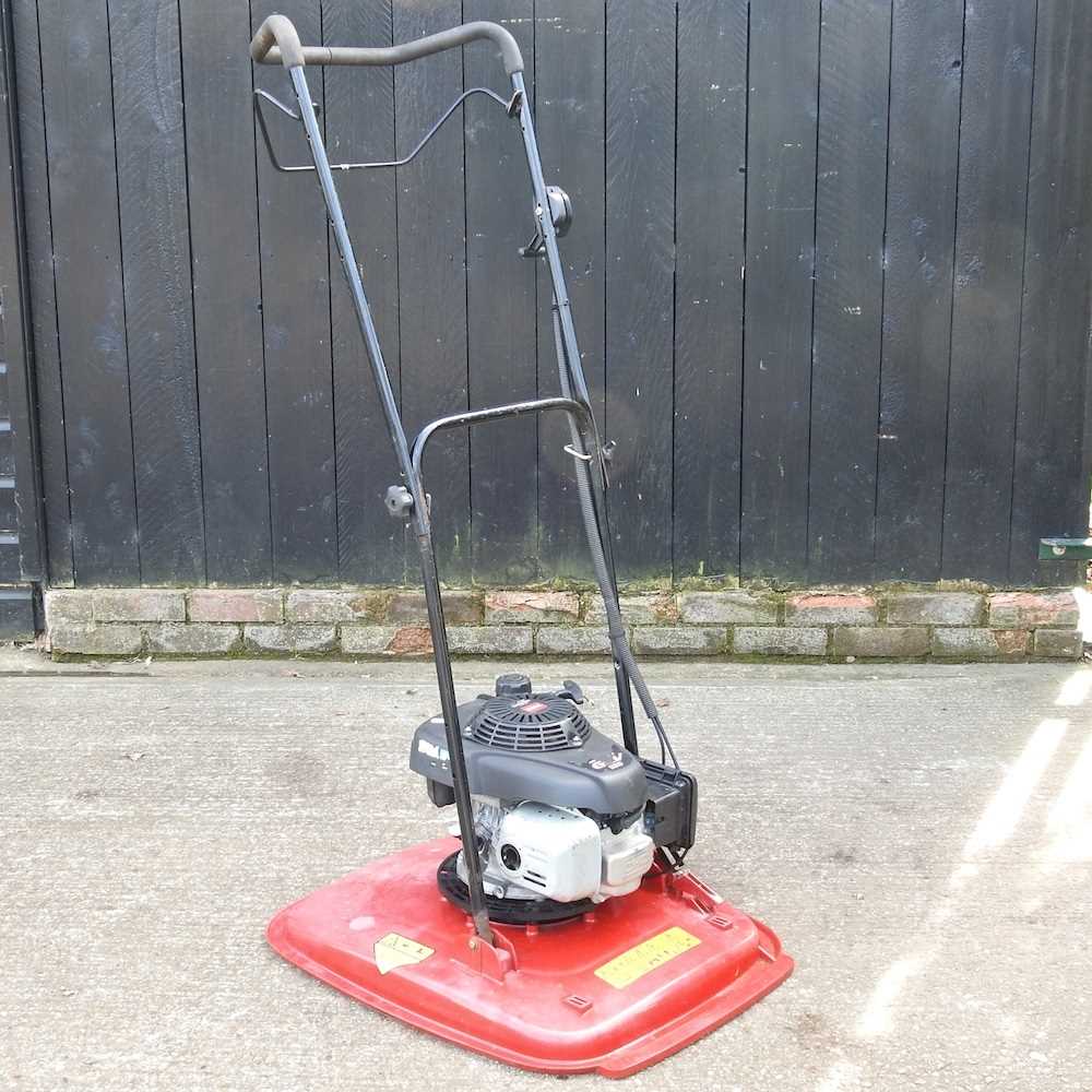 Lot 664 - A Toro/Honda GCV 160 petrol hover lawnmower