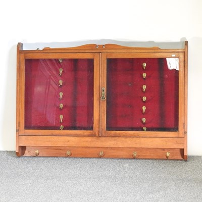 Lot 495 - An early 20th century walnut horse livery cabinet