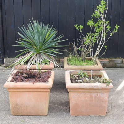 Lot 471 - A set of four large terracotta garden pots (4)