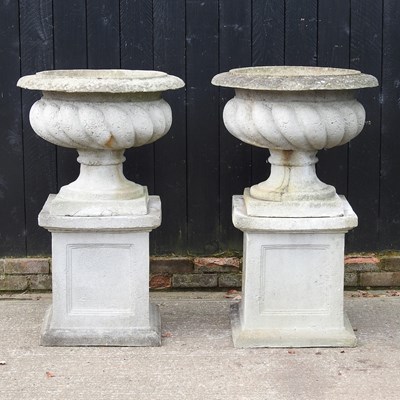 Lot 136 - A pair of large simulated stone garden...