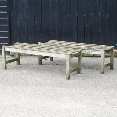 Lot 168 - A pair of slatted hardwood garden benches (2)