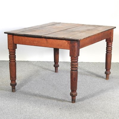 Lot 445 - An antique pine dining table