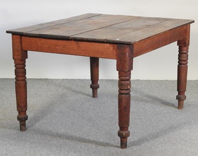 Lot 445 - An antique pine dining table