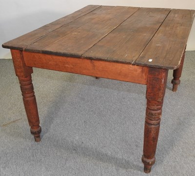 Lot 445 - An antique pine dining table