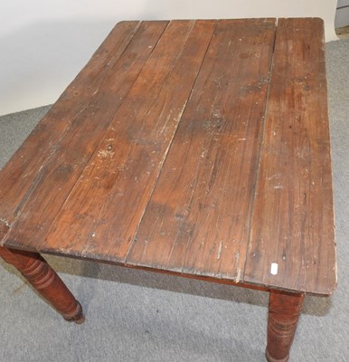 Lot 445 - An antique pine dining table