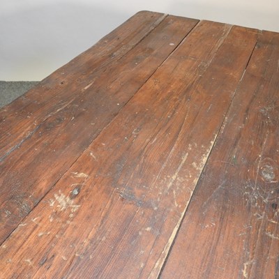 Lot 445 - An antique pine dining table