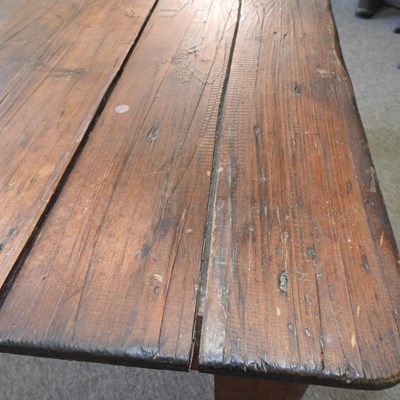 Lot 445 - An antique pine dining table