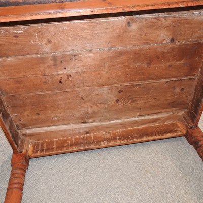 Lot 445 - An antique pine dining table