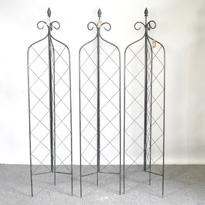 Lot 201 - A set of three folding metal garden lattice...