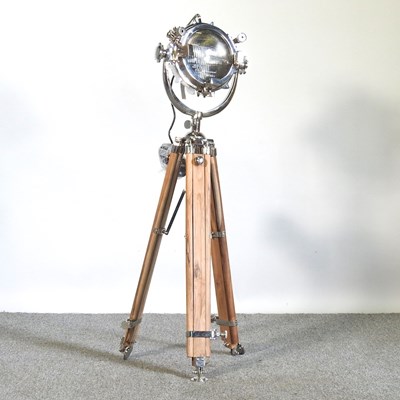 Lot 40 - A spotlight lamp on a tripod base