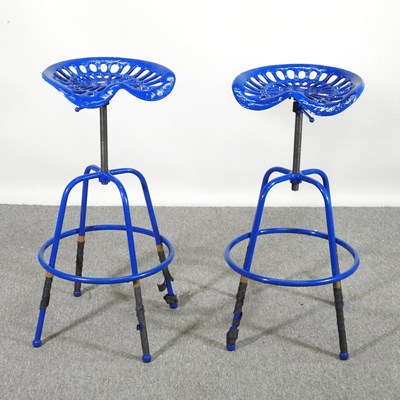 Lot 9 - A pair of blue painted metal tractor seat bar...