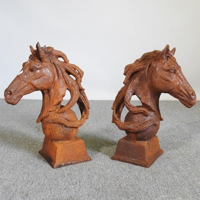 Lot 237 - A pair of rusted metal horse head gatepost...