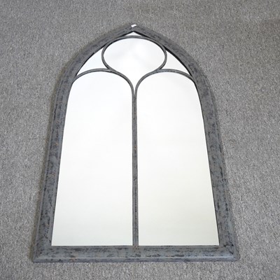 Lot 264 - A wide arched outdoor mirror, 113 x 58cm