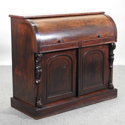 Lot 370 - A 19th century cylinder top desk